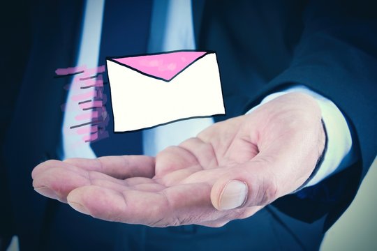 businessman holding envelope. concept of sending and receiving emails