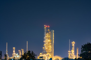 Plakat Oil and gas refinery plant area at twilight