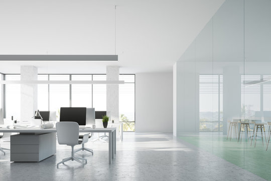 Front view of a concrete floor open space office