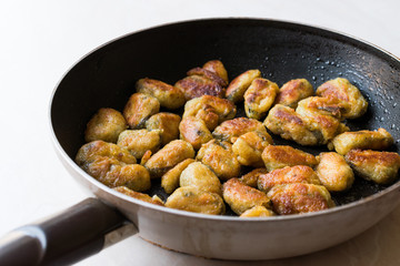Fried Crispy Mussels Cooked in Pan.