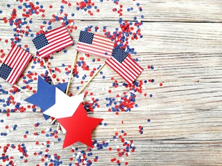 American independence Day, celebration, patriotism and holidays concept - flags and stars on the...