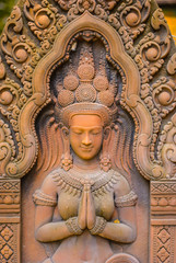 Stone carving Stucco Women Antiques based on the Hindu belief. In ancient Cambodia, Thailand,...