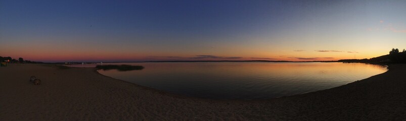 panorama of the sunset on the lake