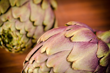 Italian artichokes on wooden plane