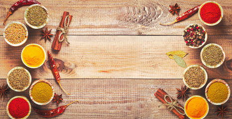 Wooden table of colorful spices
