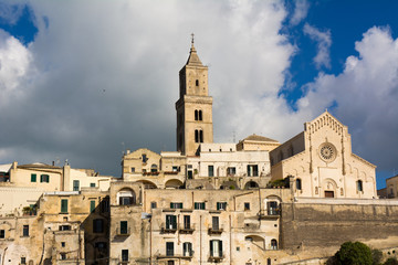 Fototapeta na wymiar Horizontal View of the City of Matera on Blue Sky Background. Matera, South Of Italy