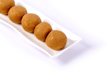 Besan Laddoo - Roasted gram flour mixed with Desi Ghee and sugar to make tasty and round shape...