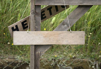 A blank wooden sign on a piece of string.