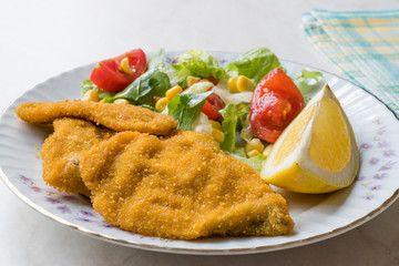 Fried Crispy Sardine Fish Plate with Salad and Lemon / Seafood Sardalya