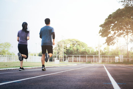 Young couple jogging workout in the morning.