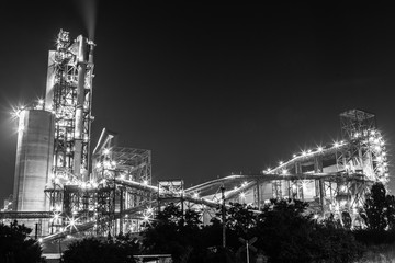 Big plant near the Novorossiysk town, Black Sea coast. Lights glow at night and make feeling of science fiction landscape.