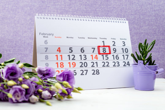  February 8 mark on the calendar on purple background