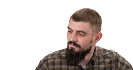 Fototapeta premium Casual man looking up to blank space over white background