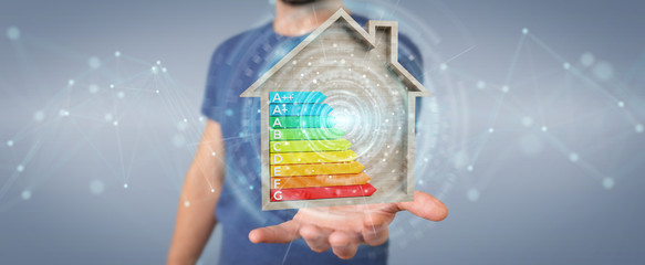 Businessman using 3D rendering energy rating chart in a wooden house