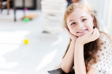 Obraz premium cute happiness kid girl is have fun and joyful moment with study book white room background