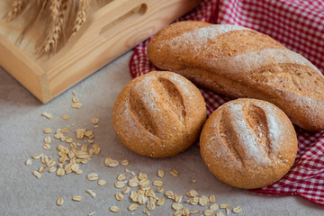 Bread and buns on fabric napkin