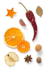 dried fruit and spices isolated on white