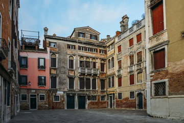 Old buildings in a piazza within Venice, Italy.