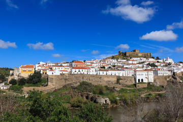 Fototapeta na wymiar Panoramic view of Guadiana river with the ancient village of Mertola in background. Mertola Portugal