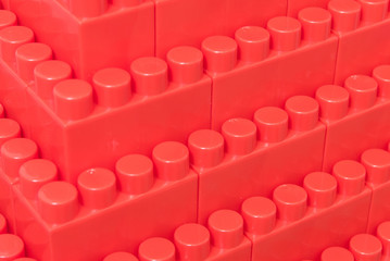 structure of children's bricks of the designer of red color