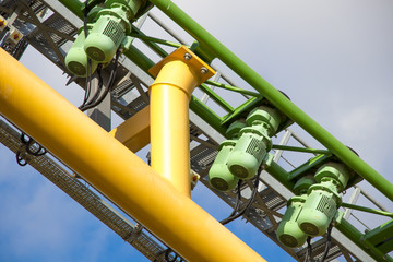 rollercoaster motor in blue cloudy sky
