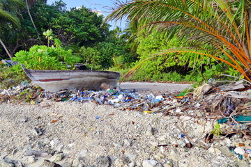 Maldives beach full of plastic garbage, sea pollution concept