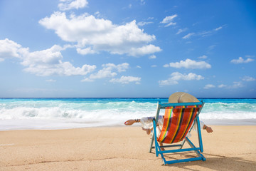 Woman on the wild beach of the island of Lefkada
