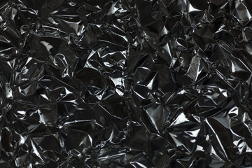 Full frame take of a sheeT of crumpled silver aluminum foil