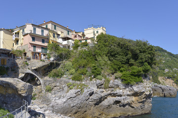Fototapeta na wymiar Tellaro is a small fishing village, perched on a cliff on the east coast of the Gulf of La Spezia in Liguria, northern Italy.
