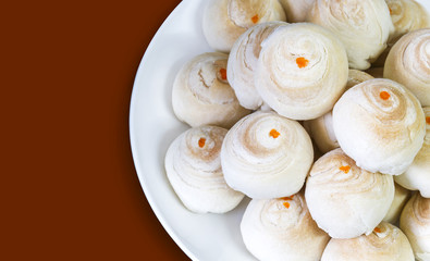 Dessert Chinese pastry or mooncake with salted egg yolk dessert on table wooden backround for celebrated Mid-Autumn and festival Chinese new year.