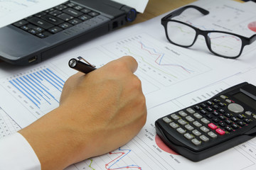 Businessman Summary report and financial analyzing concept