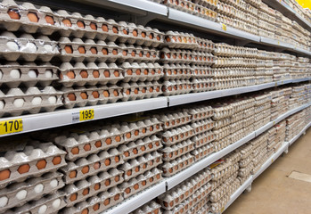 Eggs in the package at the market. stack of eggs. 