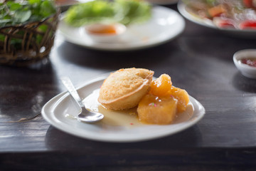 Deep fried a mango ice cream with mango jam