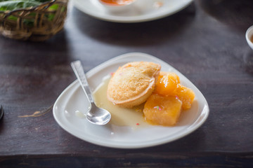Deep fried a mango ice cream with mango jam