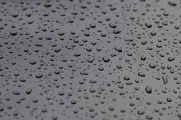 drops of water on a metal surface closeup