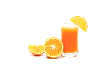 Sliced oranges and orange juice in glass on white background