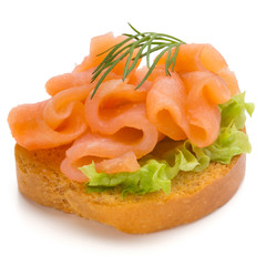 Bread with fresh salmon fillet isolated on white background, top view.