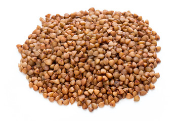 Fototapeta premium Buckwheat grains isolated on the white background.