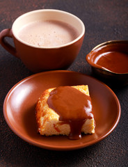 Cheesecake slice with caramel sauce