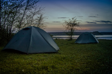Tourist tent camping on the river bank. Southern Bug. Ukraine