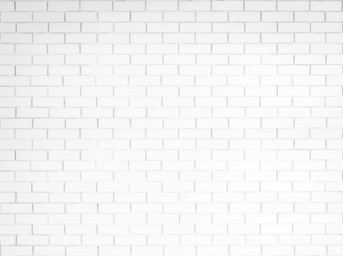 Brick tile wall texture pattern background in natural light white grey
