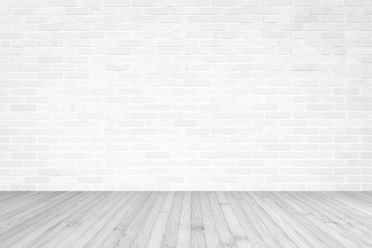 White brick wall with wooden floor textured background in light grey color