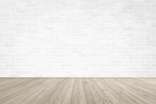 White brick wall with wooden floor textured background in sepia color