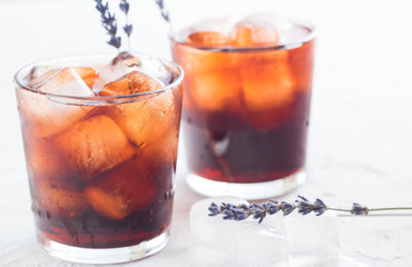 Rum and cola with ice. Cold cocktails for summer parties. Alcohol.