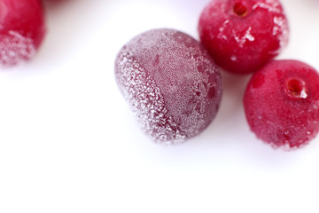 Group of frozen cherries.