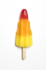 Rocket shaped ice lolly on a white background.