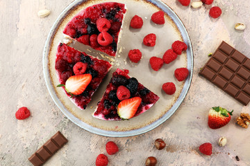 raspberry cake and many fresh raspberries