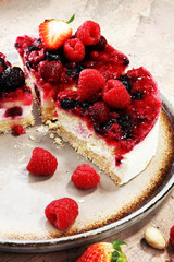raspberry cake and many fresh raspberries