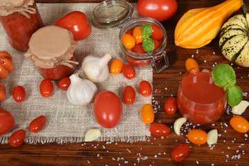 white garlic and yellow and red cocktail tomatoes and juice