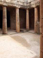 Corner and door of the ancient burial chamber with columns and doorway of tomb number 3 at the 'Tomb of the Kings' necropolis in Paphos, Cyprus.